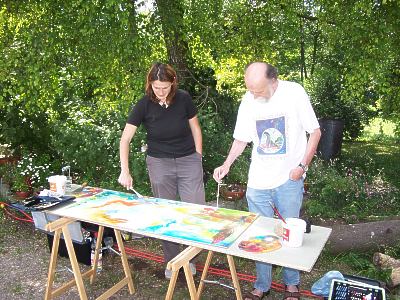 Die K&uuml;nstler Andrea Walla aus Altenstadt und Helmut Toischer bei der Malvorf&uuml;hrung